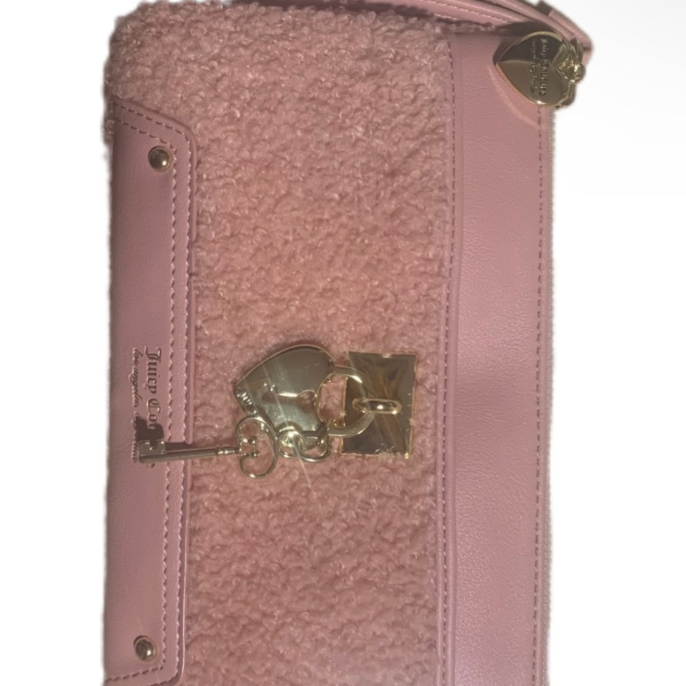 Juicy Couture Pink Wristlet with Gold Charm.